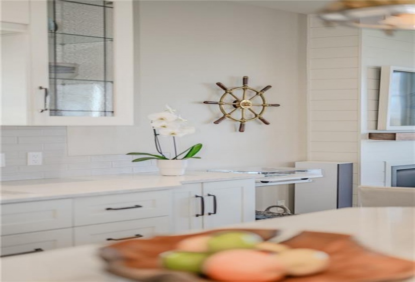 Transitioning seamlessly into the living room space, the kitchen is a classically design space to ensure beauty and enjoyment for years to come.