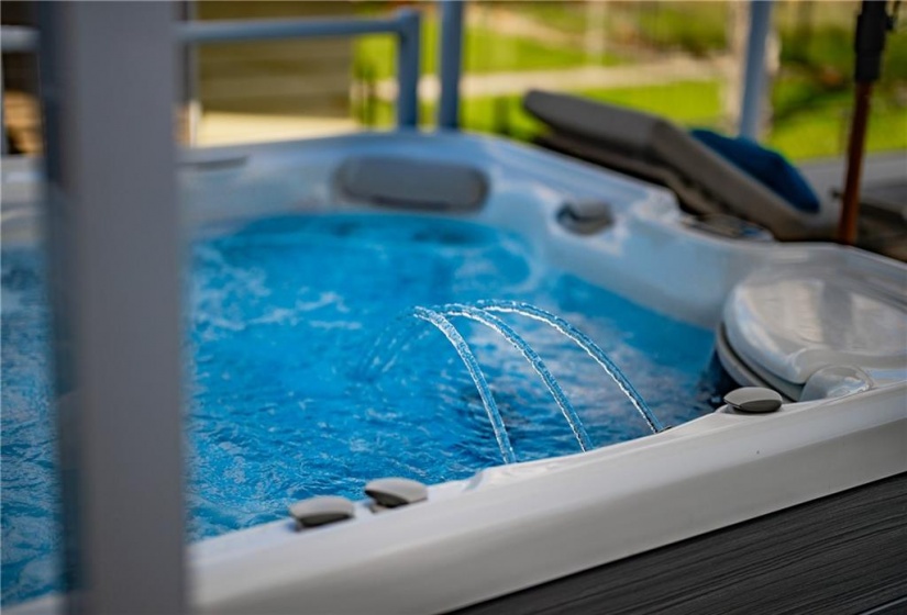 The Hot Springs Salt Water Hot Tub offers the ultimate in terms of relaxation. The added waterfall feature amplifies your experience.