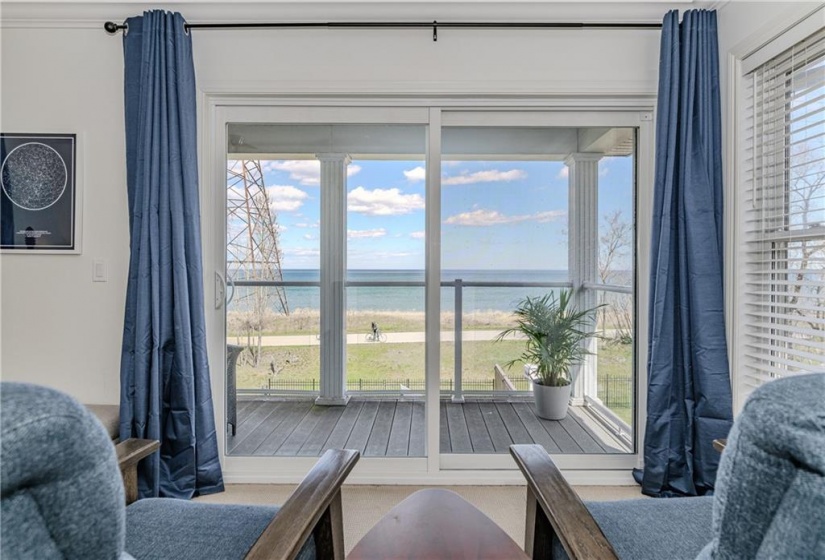 As seen from your primary bedroom, the newly installed oversized patio doors offer a more secluded spot to enjoy the view.