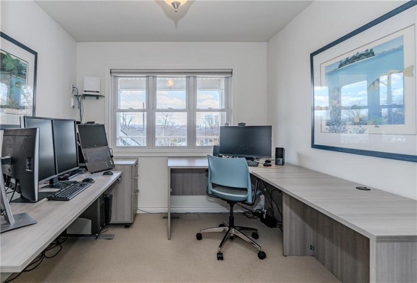 One of two additional bedrooms is currently used as a work-from-home office space. The footprint and closet within allow for a dedicated bedroom or even a nursery.