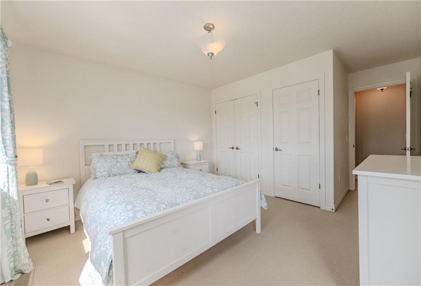 The second additional bedroom is an ideal guest space or teen retreat. With dual closets there is amble storage for both everyday and seasonal wears. Quick access to the additional full bath found just outside the door.