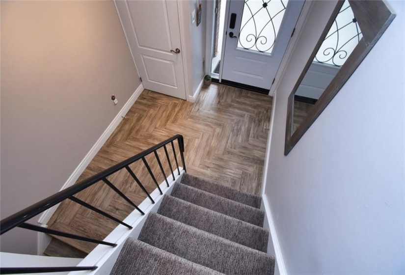 - ground level foyer, staircase to 2nd level