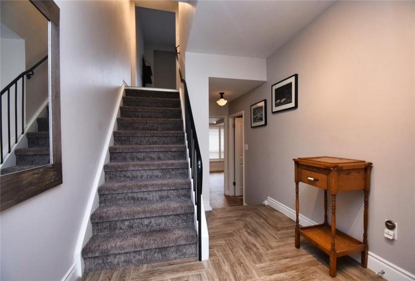 - ground level foyer, staircase to 2nd level