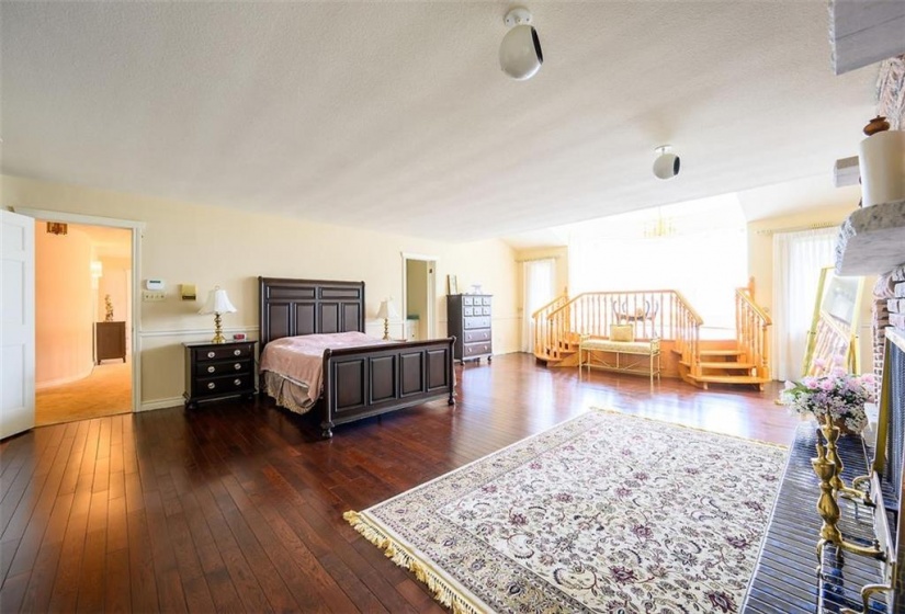 master bedroom with fireplace