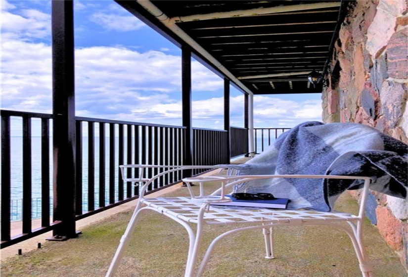 Looking out from the boathouse, enjoy the bright blue waters of Lake Ontario.