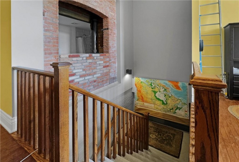 20 foot ceiling in the stairwell, arched window brings sunlight into the washroom