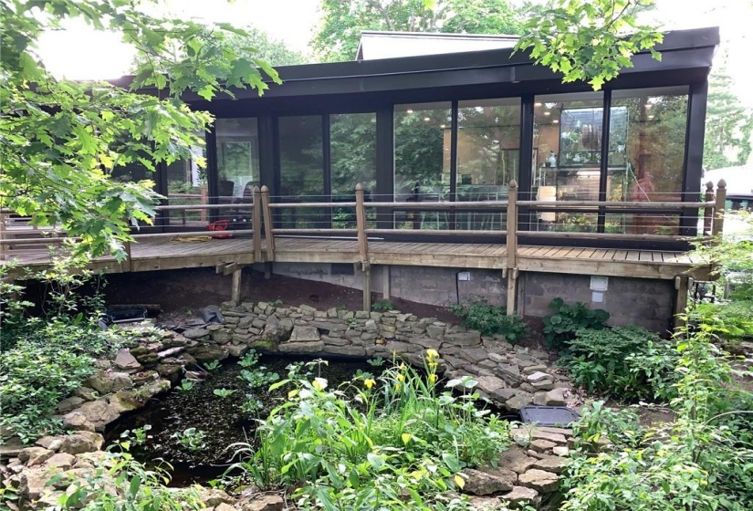 Rear view deck and fish pond