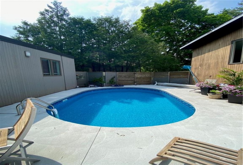 Side yard with 4 foot deep in ground pool