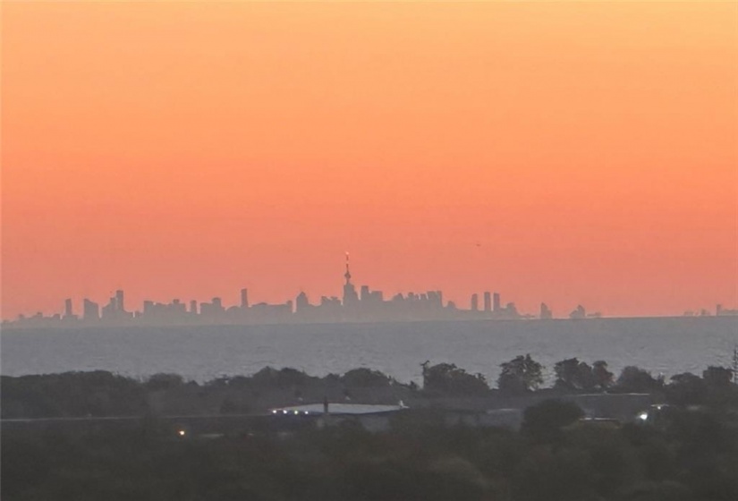 View from inside & back deck of city, lake & Toronto skyline