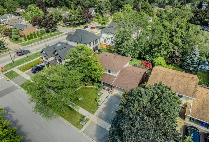 Beautiful landscaping brings family and friends up to your front door. Enjoy a covered porch while sitting out and watching the kids shoot hoops, ride bikes or decorate the sidewalks with colourful chalk creations.