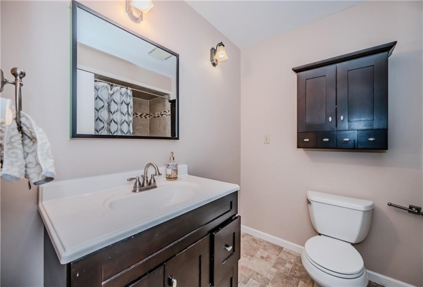 The main bath is central to the kids bedrooms.