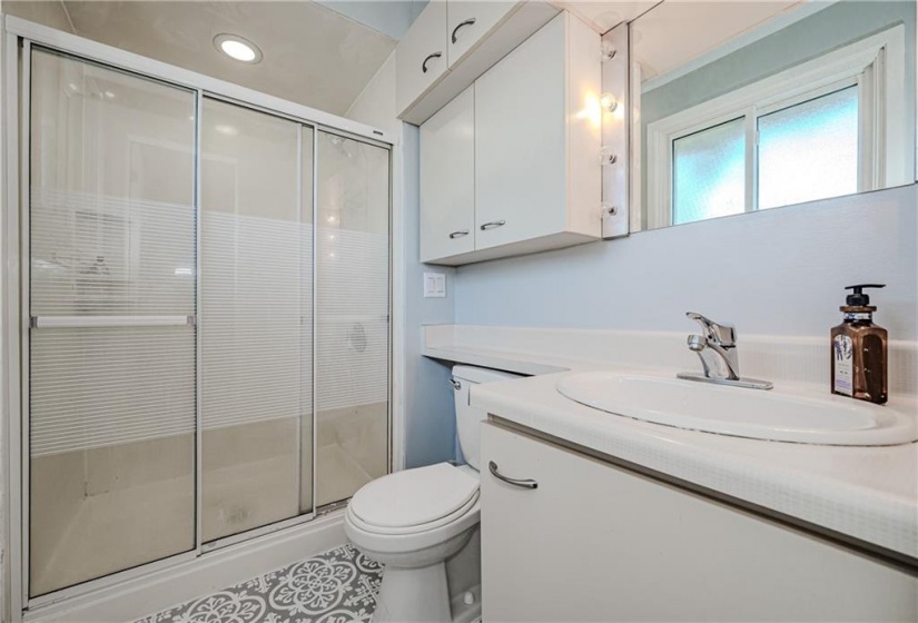 Freshly painted and new flooring in the ensuite bath.