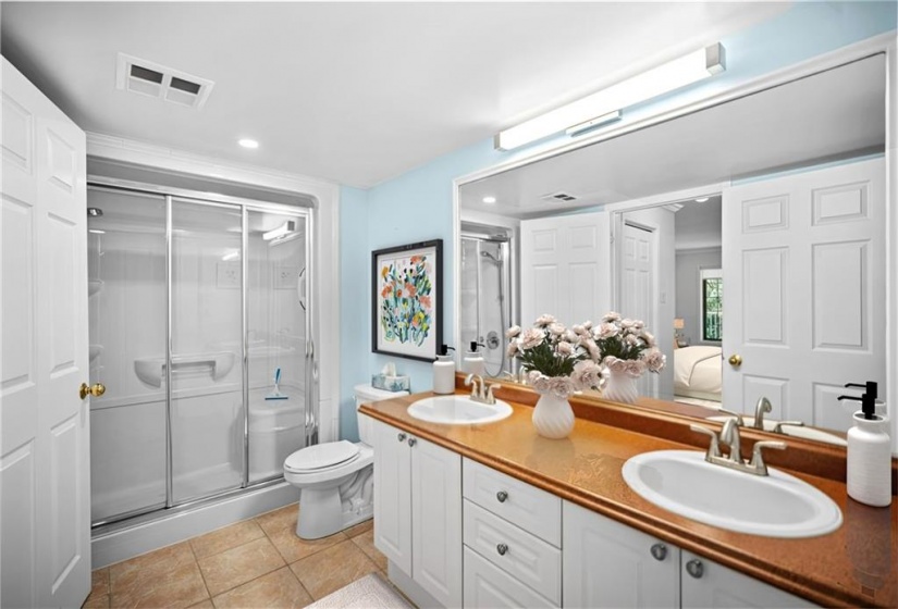 Large bathroom with double sinks and an updated walk-in shower!