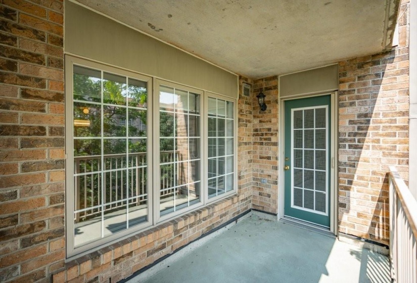 Spacious balcony with screen door off of living room!