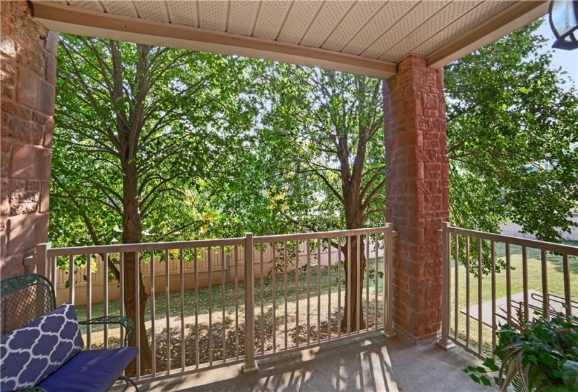 Tree-lined view of balcony