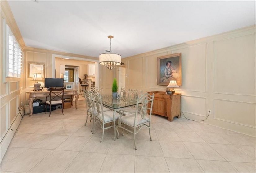 Family or casual dining room overlooks front, adjoins kitchen and mudroom.