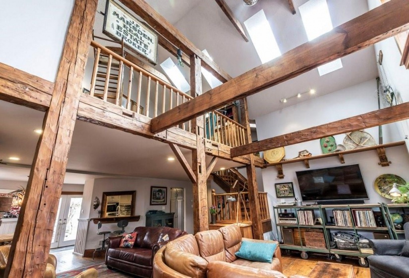 Great room - vaulted ceiling - skylights