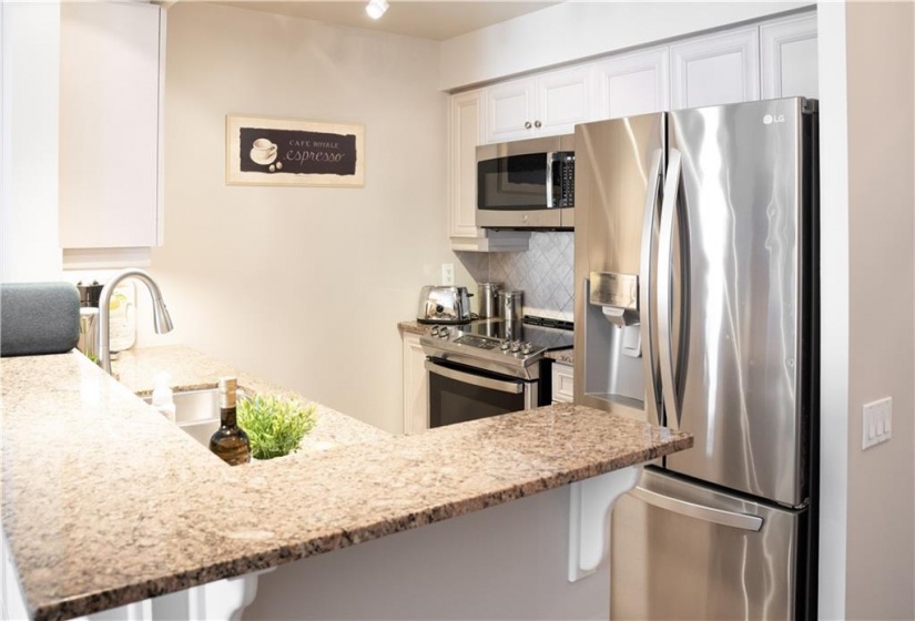 Granite Countertops with new Stainless Appliances