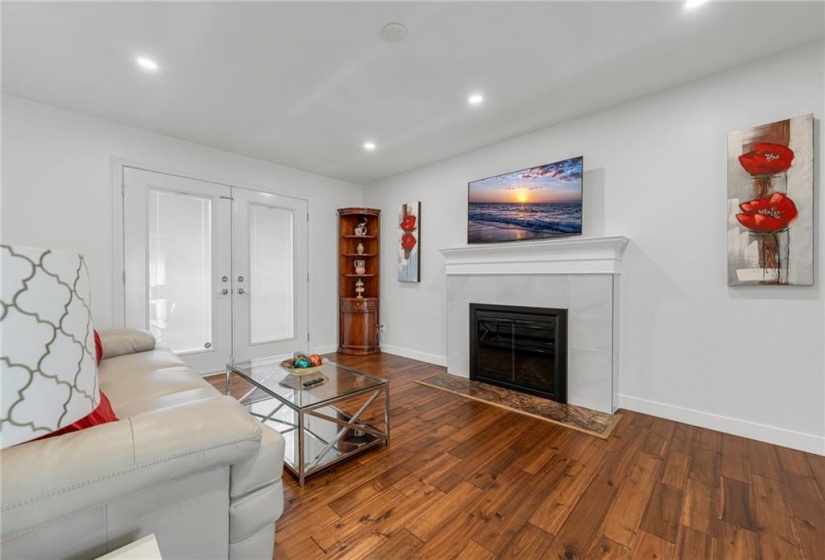 Family room with wood fireplace