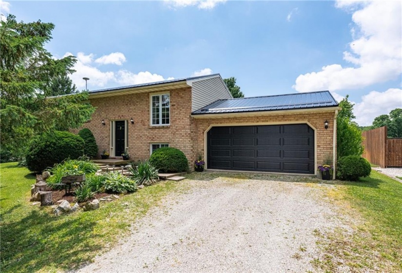 Newer Garage Door & Metal Roof