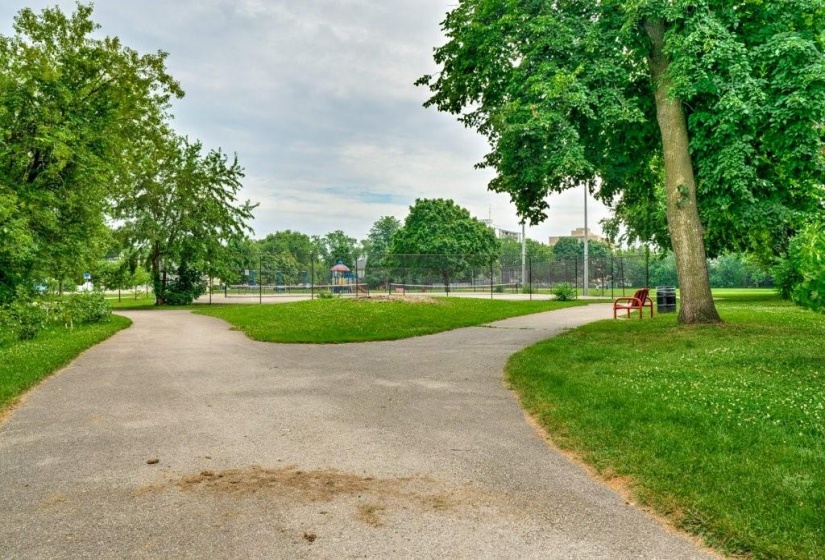 Safe & Easy Walk through to School & Optimist Park with Tennis/Pickleball, Baseball, Playground & Basketball court!