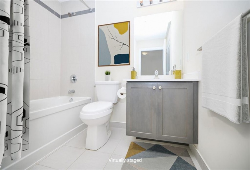 4pc bathroom with floating vanity and quartz counter top