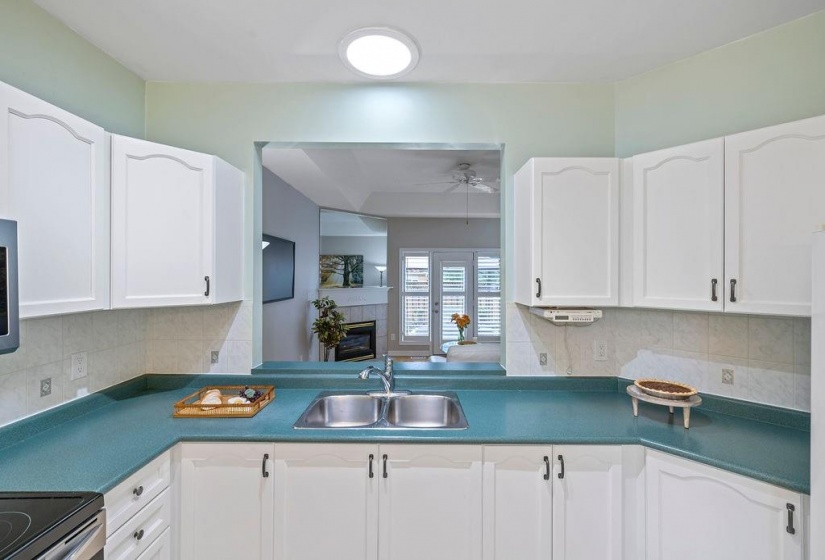 Tubular skylight over kitchen sink provides natural light