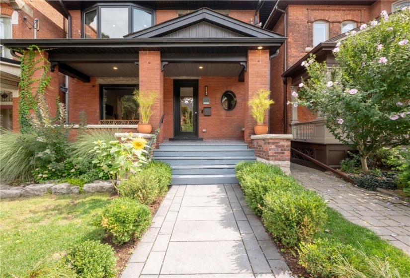 Stone walkway welcomes you to this gorgeous one-of-a-kind home