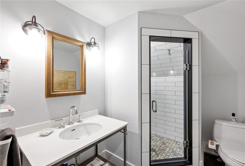 Another STUNNING full (3-pc) bathroom in the upper unit (3rd flr).