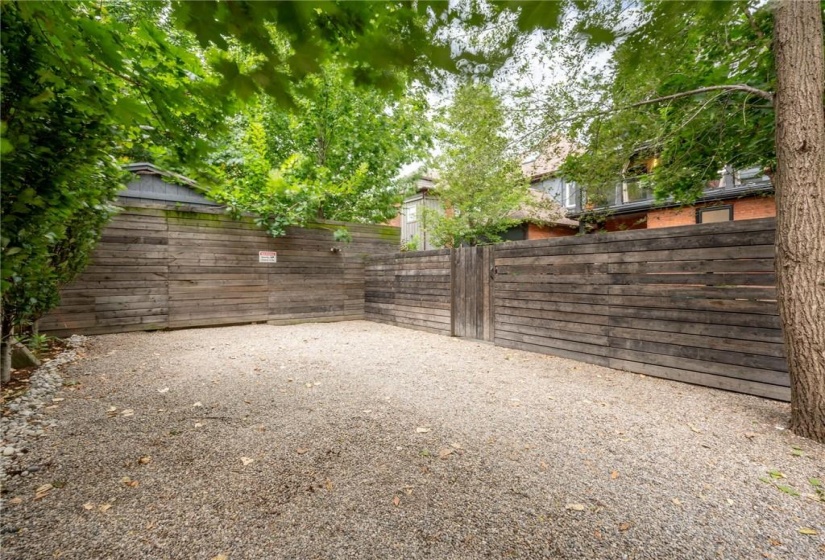 2 parking spaces at rear of property (accessed via alley) and has gate that opens into the backyard