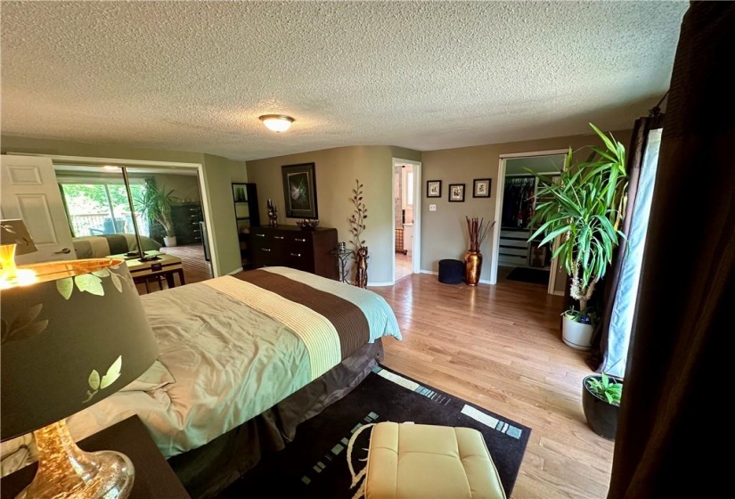 Master bedroom with his and hers closet and walk-in closet,  5 piece en-suite w/Jacuzzi tub and shower