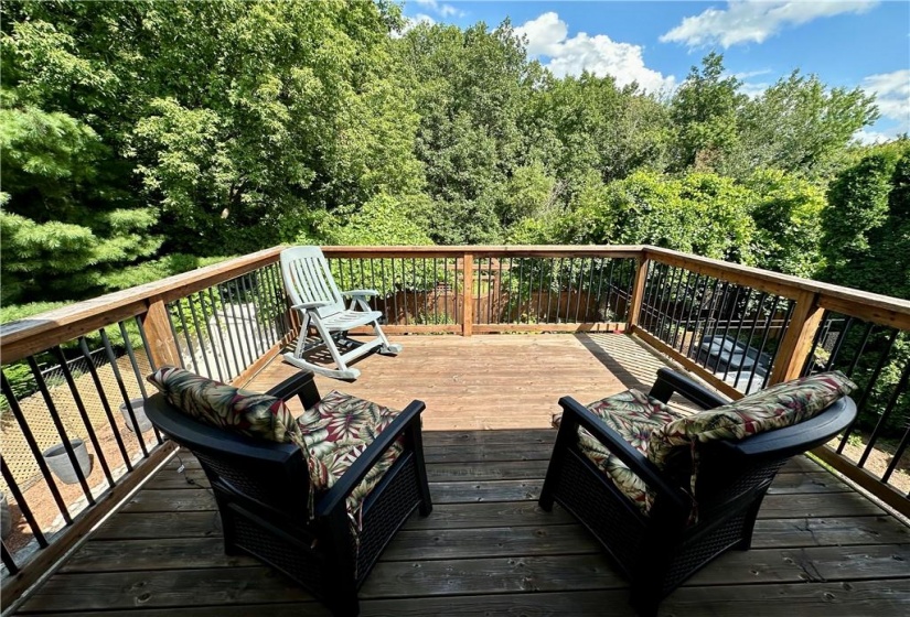 Master bedroom deck overlooking the tranquil backyard and peaceful Bruleville Nature park , a great way to relax and enjoy your morning coffee