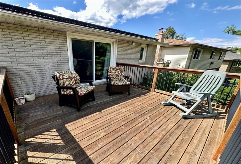 Master bedroom deck overlooking the tranquil backyard and peaceful Bruleville Nature park , a great way to relax and enjoy your morning coffee