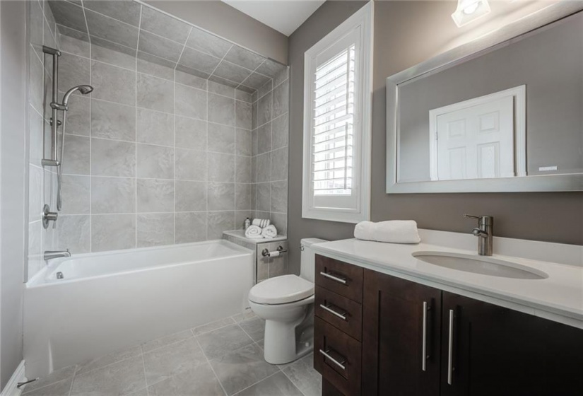 Main 4pc Washroom with Maple Vanity & Caesarstone Counter