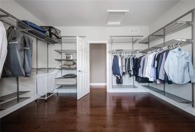 Primary Walk-in Closet has ample storage - it would make a great nursery