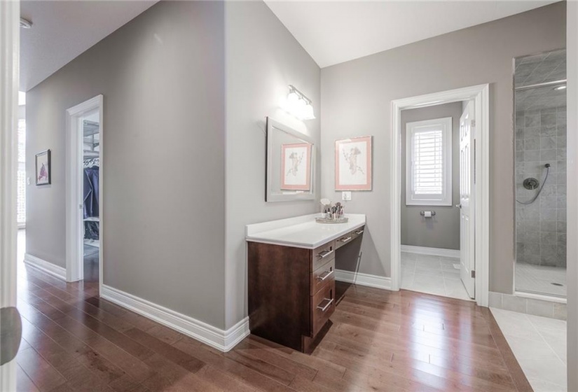 Opulent Ensuite with water closet and Built-In Vanity