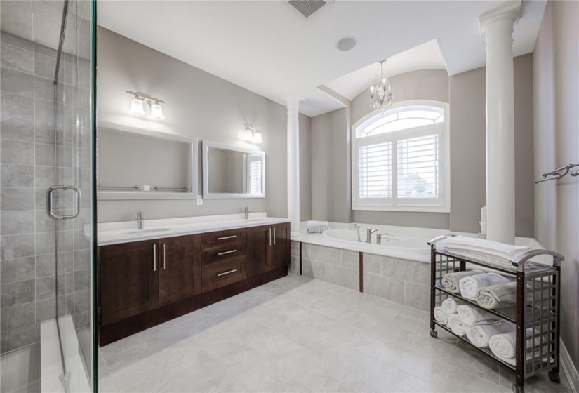 6pc Ensuite features Heated Floors, Double Sinks in Maple Vanity