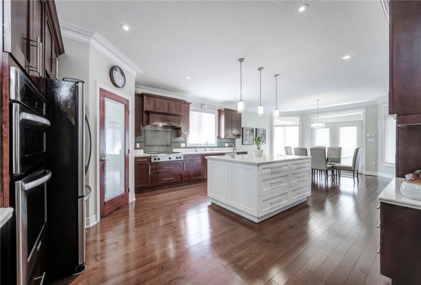 Large Kitchen with custom built Maple Cabinetry