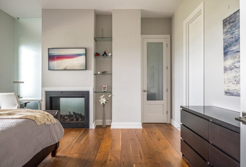 Door To Balcony, Fireplace and Walk-In Closet