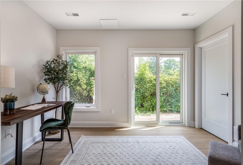 Bonus room with sliding doors to private Step-out Garden Patio